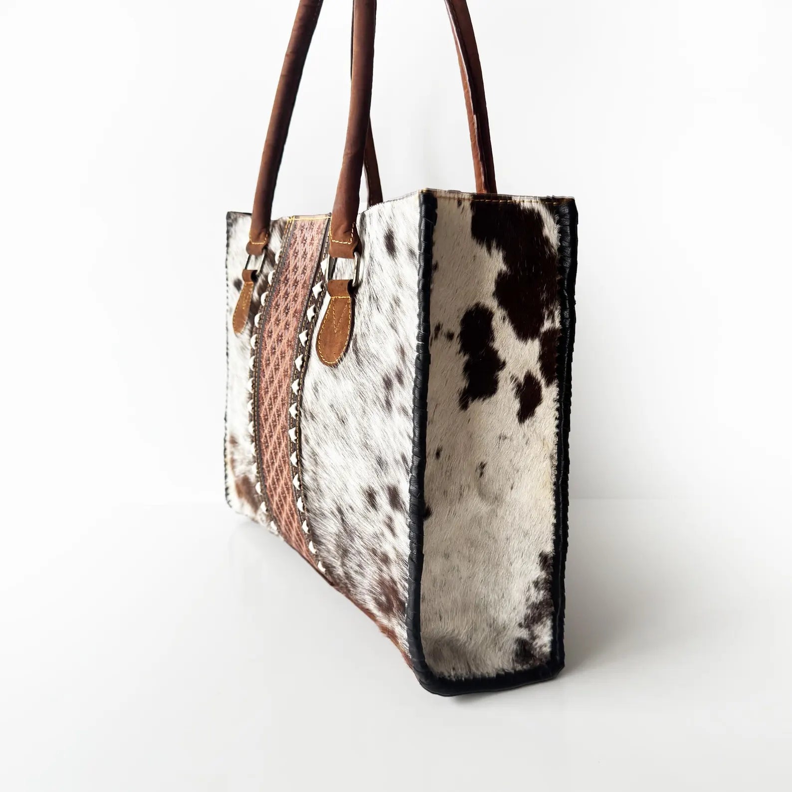Artisan Cowhide tooled Leather Tote Bag: Handcrafted Shoulder Bag